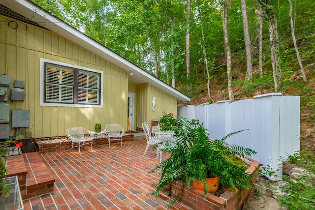 view of patio / terrace featuring fence
