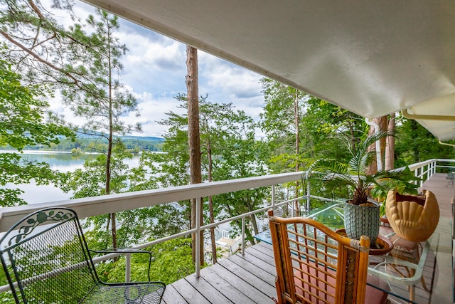 deck featuring a water view