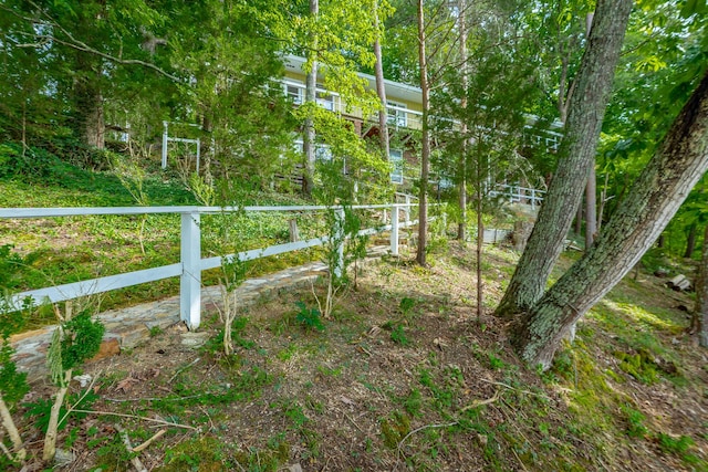 view of yard featuring fence