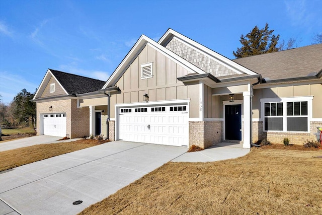 view of front of home with a garage and a front yard