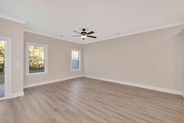 spare room with ornamental molding, ceiling fan, and light wood-type flooring