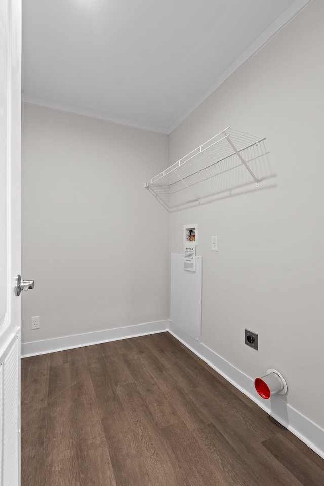 laundry room featuring washer hookup, ornamental molding, dark wood-type flooring, and electric dryer hookup