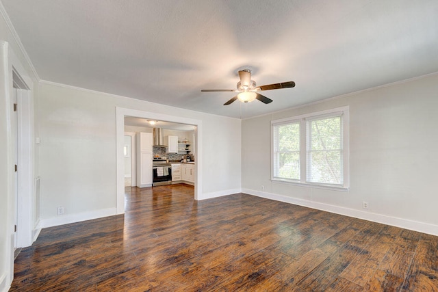 unfurnished living room with ornamental molding, dark wood-type flooring, and ceiling fan