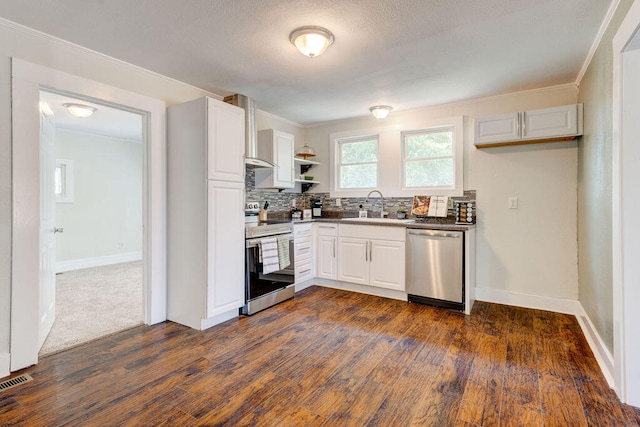 kitchen with crown molding, sink, dark hardwood / wood-style floors, appliances with stainless steel finishes, and white cabinets