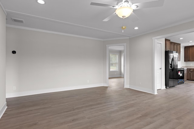 unfurnished living room featuring ceiling fan, crown molding, and light hardwood / wood-style floors