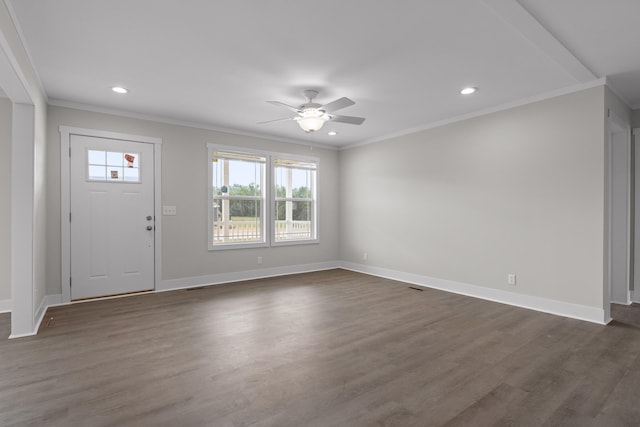 entrance foyer featuring ceiling fan, crown molding, and dark wood-type flooring