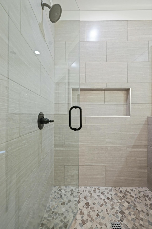 bathroom with a stall shower