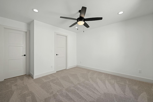 unfurnished bedroom featuring recessed lighting, a ceiling fan, baseboards, and carpet floors