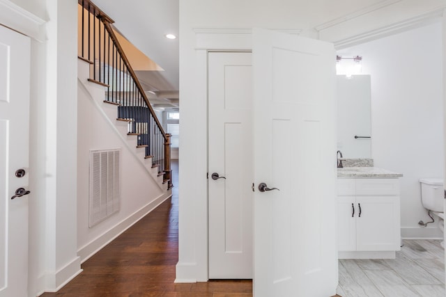 hall featuring wood-type flooring