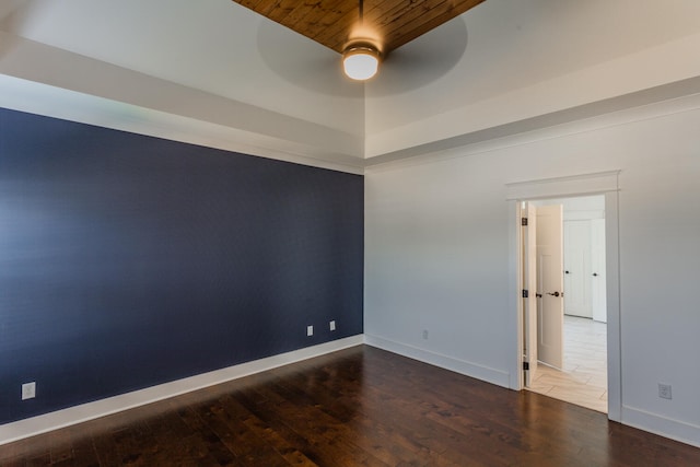 unfurnished room featuring ceiling fan, hardwood / wood-style floors, and wooden ceiling