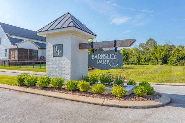 view of community sign