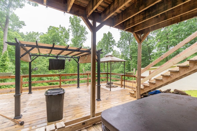 wooden deck featuring a pergola