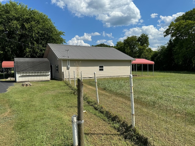 view of yard with a carport