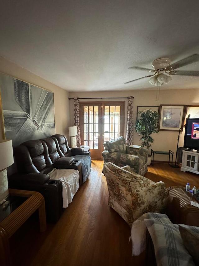 living room with french doors, ceiling fan, and hardwood / wood-style flooring