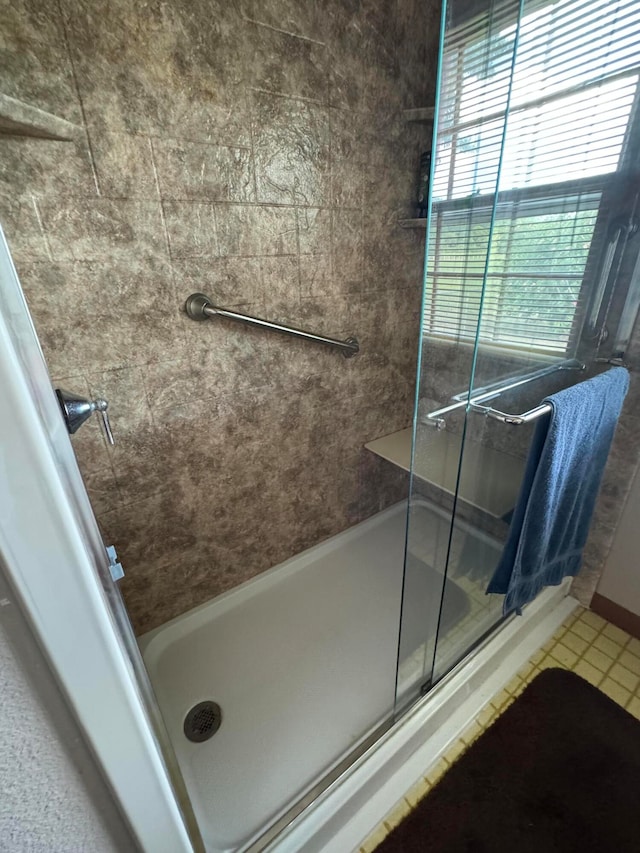 bathroom featuring an enclosed shower