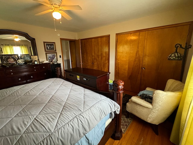 bedroom featuring hardwood / wood-style flooring and ceiling fan