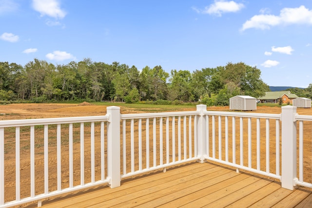 wooden deck with a shed