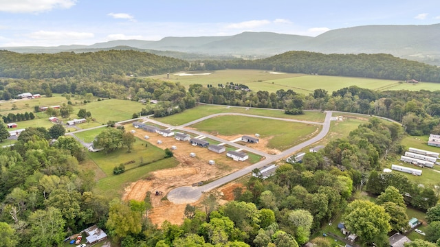 aerial view with a mountain view and a rural view