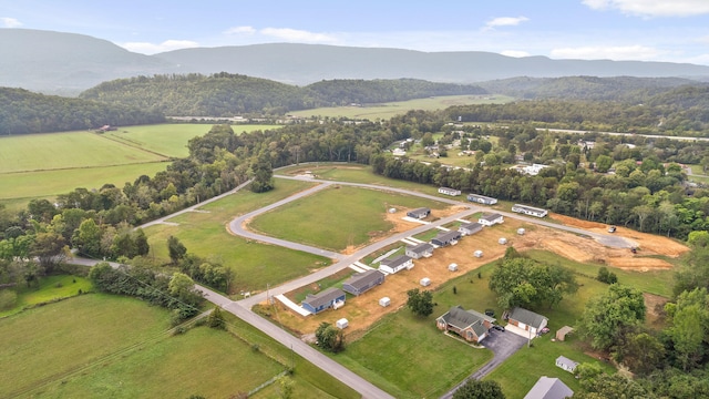 aerial view featuring a mountain view and a rural view