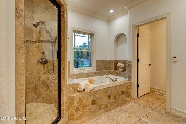 bathroom with shower with separate bathtub and ornamental molding