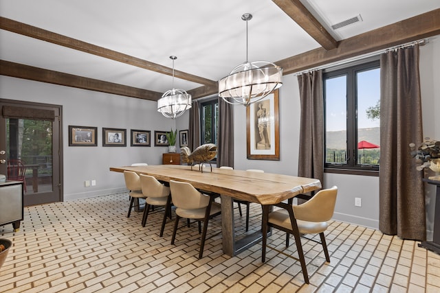 dining area featuring a notable chandelier and beam ceiling