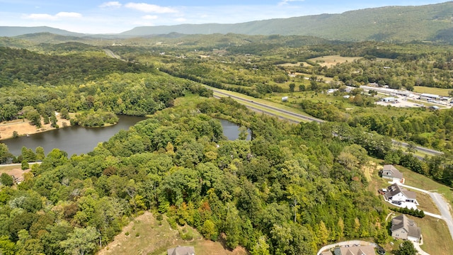 aerial view with a water and mountain view