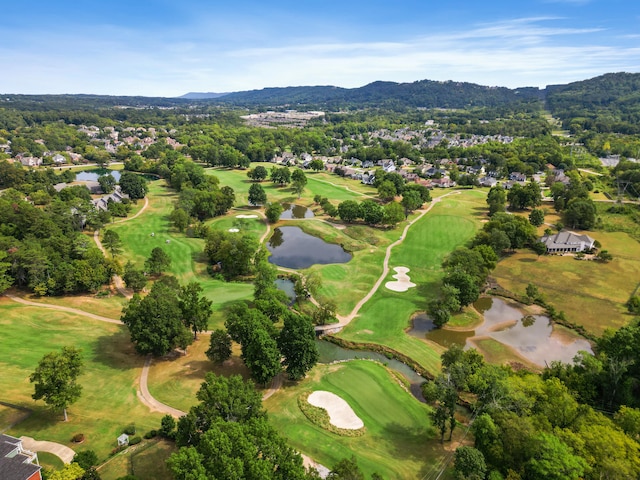 aerial view featuring a water and mountain view