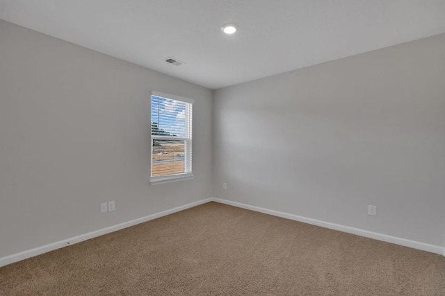 view of carpeted spare room