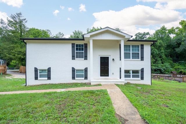 bi-level home featuring a front yard