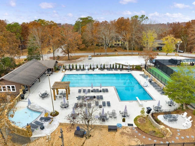 view of pool featuring a patio area