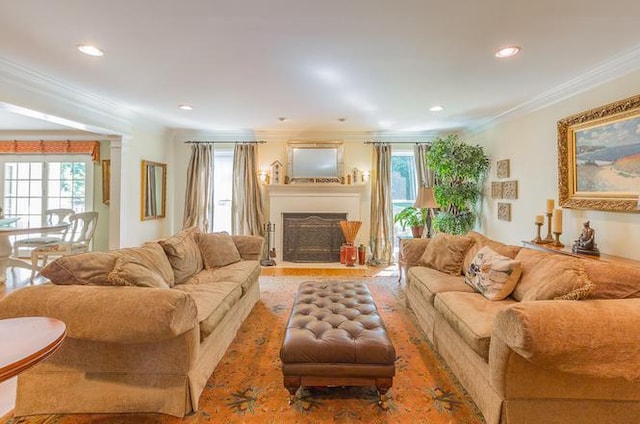 living room with ornamental molding and wood-type flooring