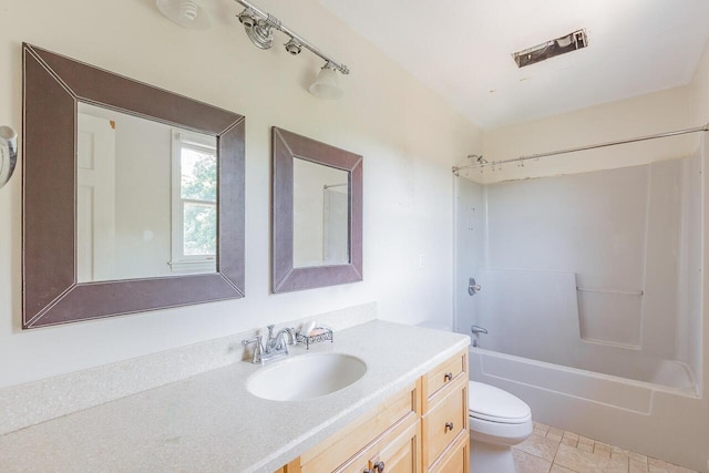 full bathroom with shower / bathing tub combination, vanity, toilet, and tile patterned flooring