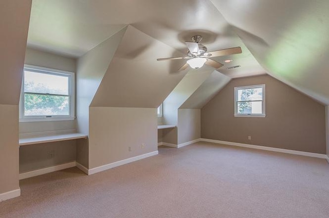 bonus room featuring carpet, ceiling fan, and vaulted ceiling