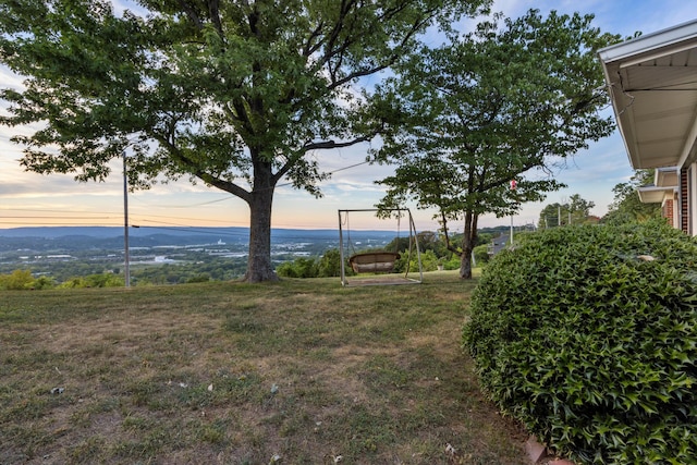 yard at dusk with a mountain view