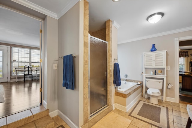 bathroom with separate shower and tub, toilet, hardwood / wood-style flooring, and crown molding