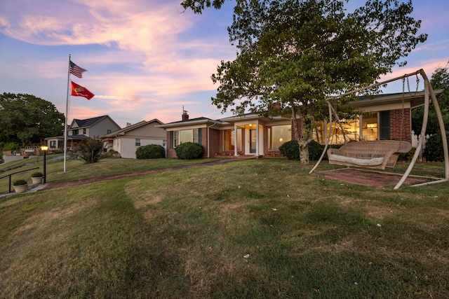 view of front facade with a lawn