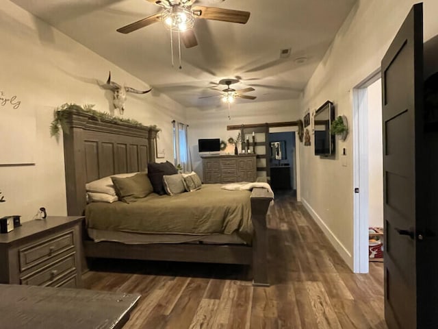 bedroom featuring dark hardwood / wood-style floors and ceiling fan