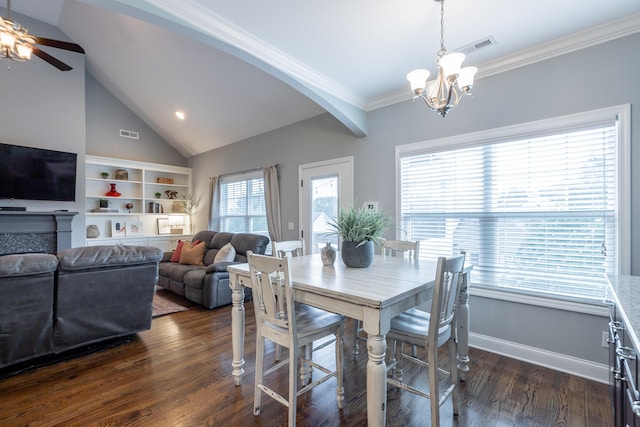 dining space featuring crown molding, dark wood-type flooring, vaulted ceiling, and ceiling fan with notable chandelier