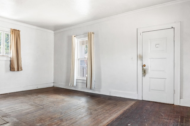 entrance foyer with crown molding and dark wood-type flooring