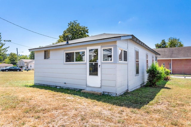 exterior space with a lawn