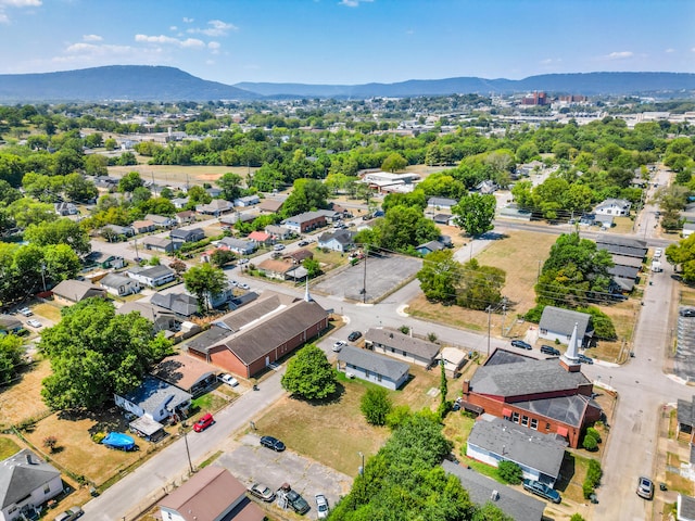 drone / aerial view featuring a mountain view