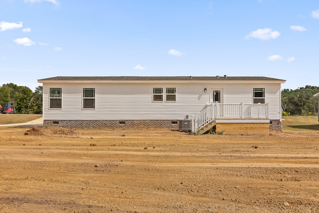 view of front of house featuring central air condition unit