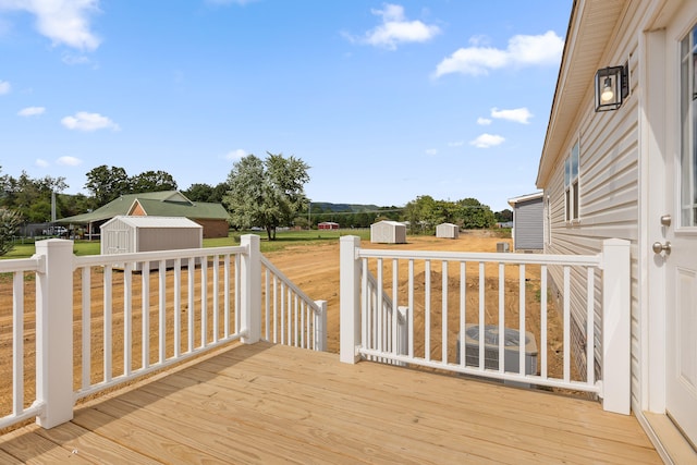 deck with a storage shed