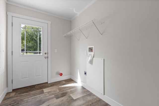 washroom featuring hookup for an electric dryer, hookup for a washing machine, dark hardwood / wood-style flooring, and ornamental molding