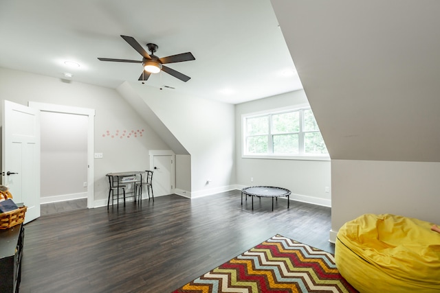 additional living space featuring lofted ceiling, ceiling fan, and dark hardwood / wood-style flooring