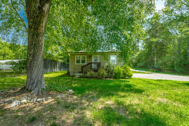 view of front of house with a front lawn