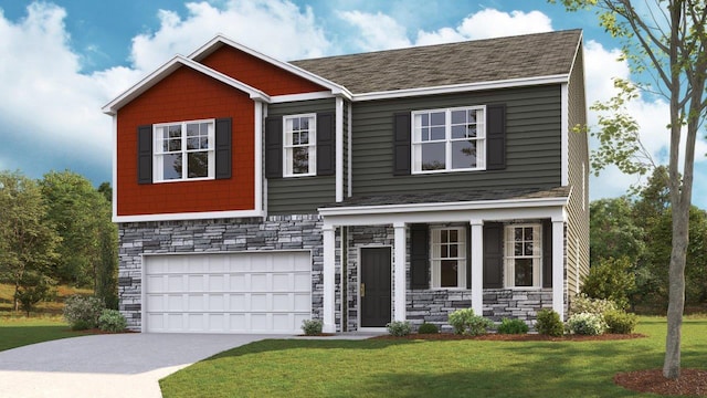 craftsman house featuring a garage and a front yard