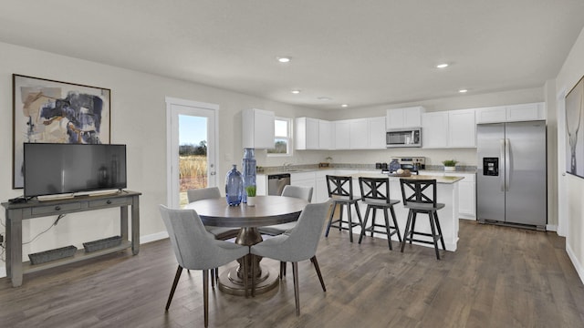 dining room featuring dark wood-type flooring