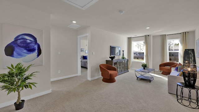 living room featuring light colored carpet