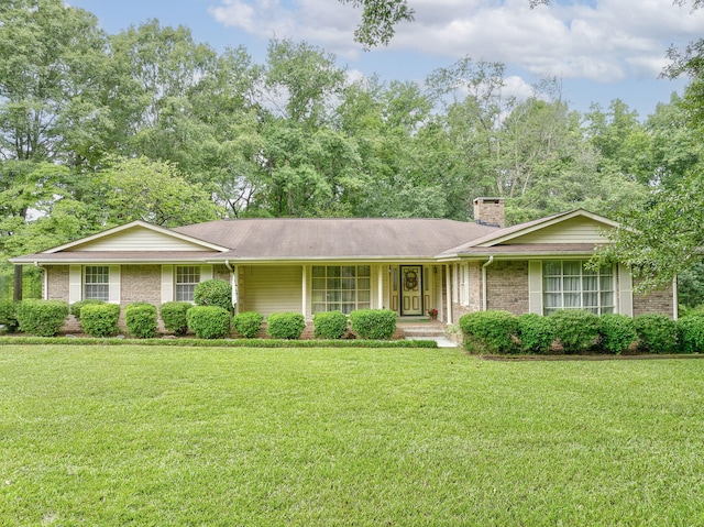 single story home with a front yard